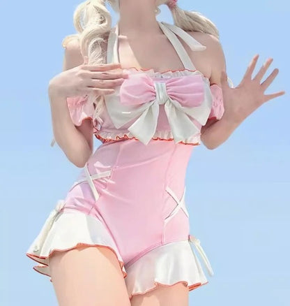 Pink Coastal Dream Cutie Onesie with soft lace, ruffles, and sweet bow detail