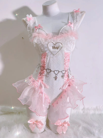 Pink corset top featuring adjustable lacing and “baby” script, delicate lace and satin blend for a luxe babydoll look