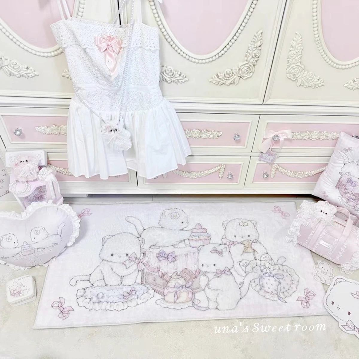 Cozy pastel pink kitty lounge rug with Sweet Paws design for cute room decor
