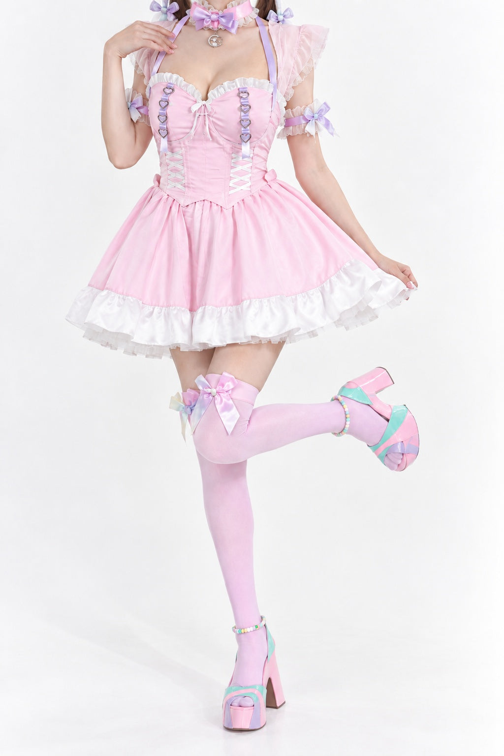 Model posing in Pink Princess Lolita maid corset dress with bow choker