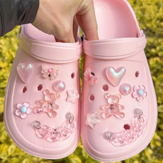 Pink shoe charm set with bears, hearts, and bows for customizing sneakers and sandals