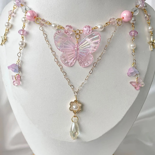 Pink Whisper Butterfly Necklace with shimmering crystal butterfly pendant and dainty adjustable chain