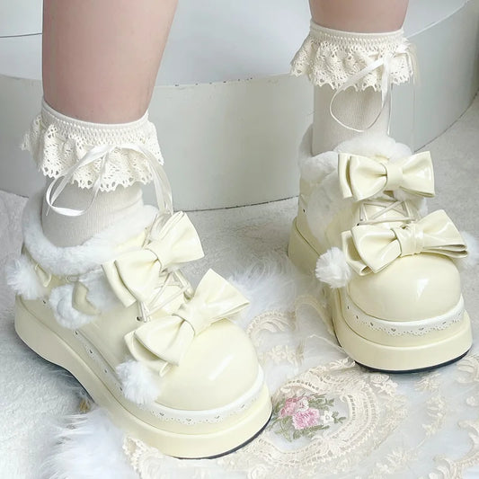 Pom Pom Angel Baby Platform Shoes in pastel yellow with ribbon bows and plush trim for DDLG kawaii vibes