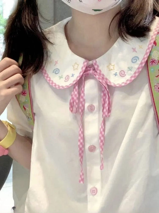 Preppy plaid doll blouse with lace ribbon collar and breathable fabric, perfect for layering and kawaii outfits