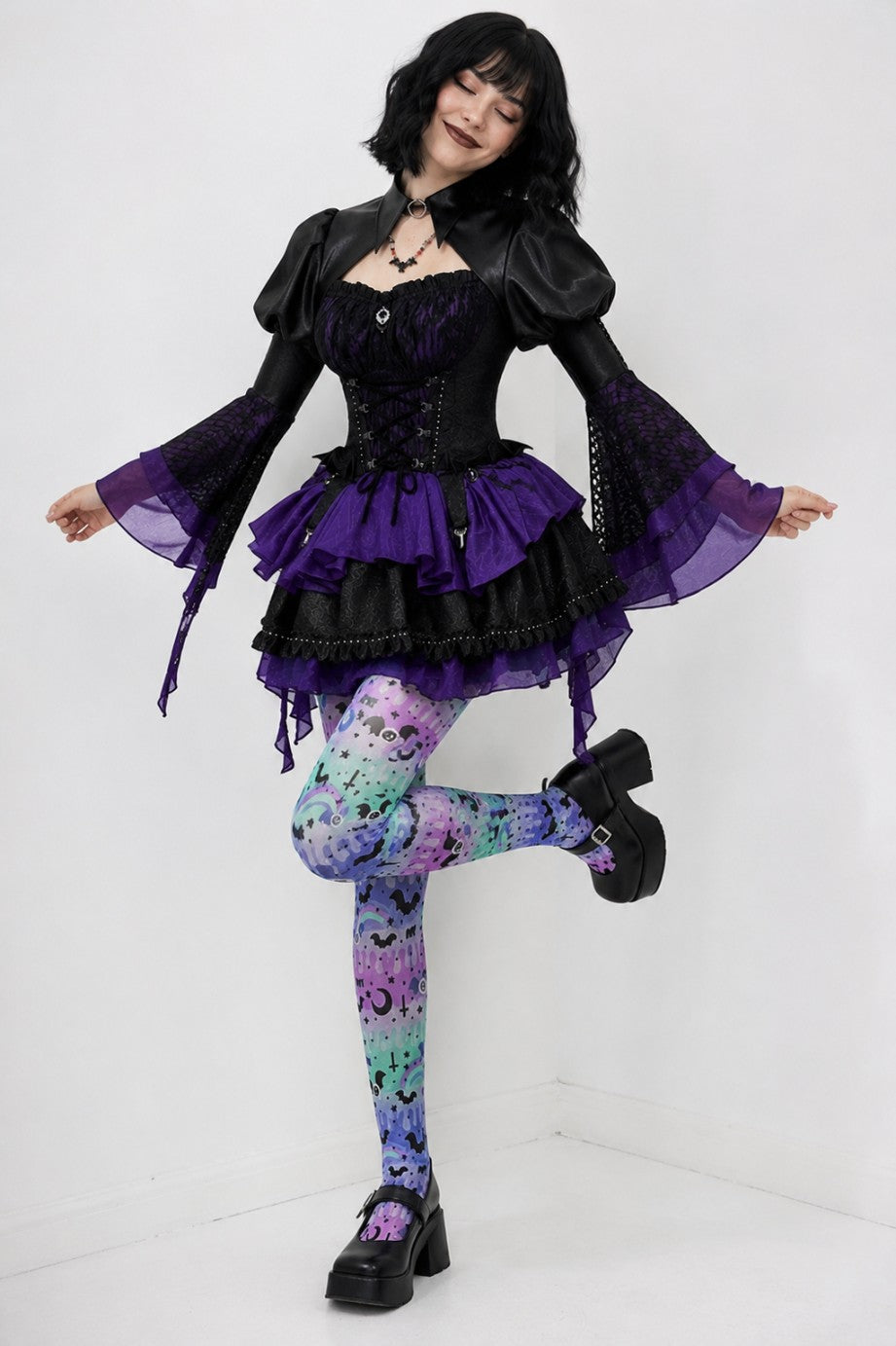 Model posing in Pretty Goth Doll Lolita Set showing bolero and skirt silhouette