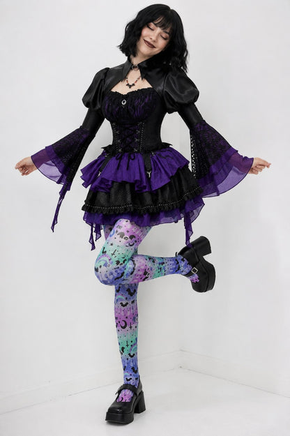 Model posing in Pretty Goth Doll Lolita Set showing bolero and skirt silhouette
