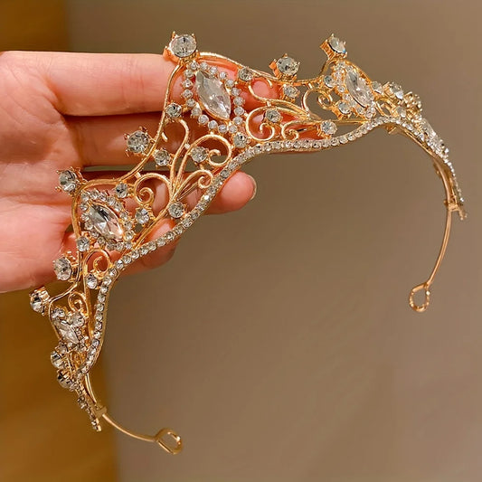 Sparkly gold princess crown hair clip for toddlers – cute, magical accessory for dress-up or playtime.