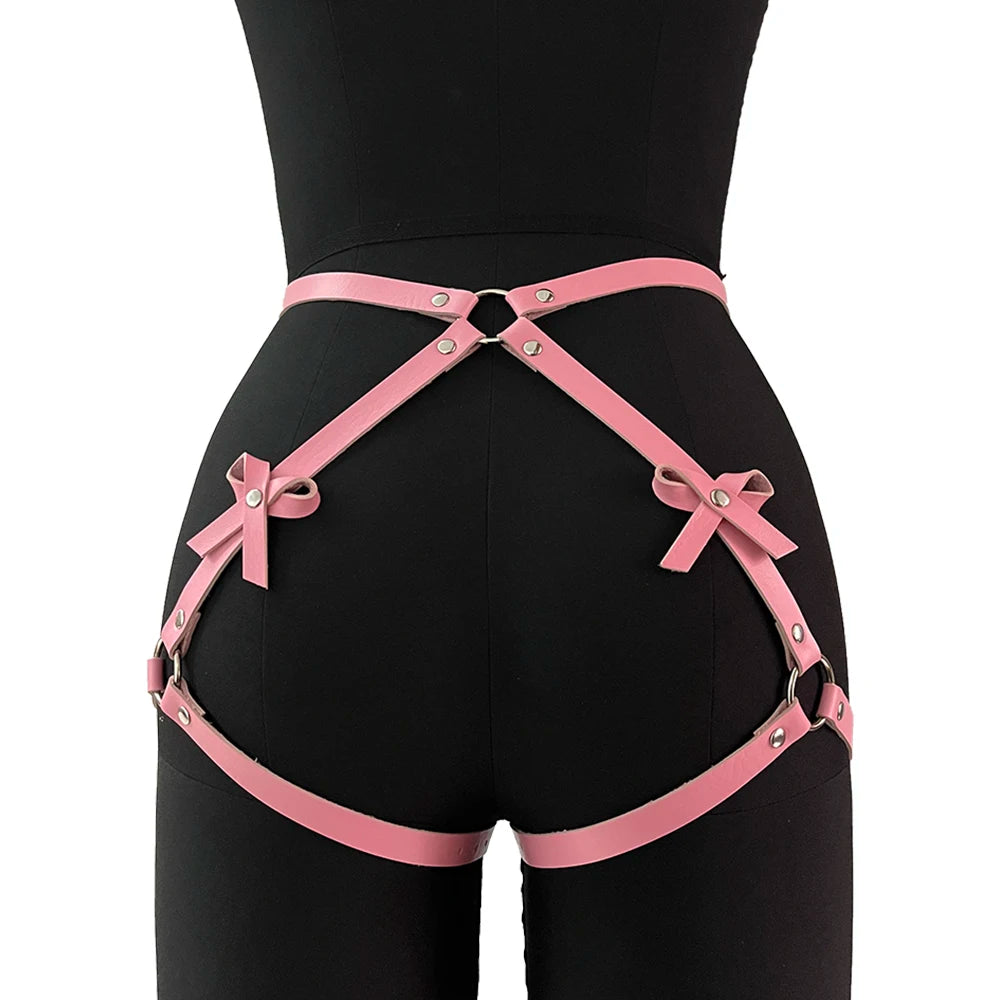 Adjustable pink Pure Seduction Harness crafted from smooth PU leather with flirty bow detail for edgy outfits
