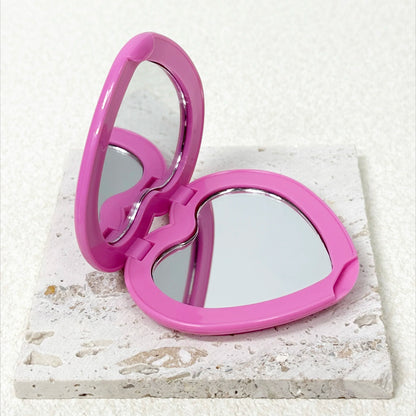 Set of purple gradient compact mirrors for on-the-go touch-ups