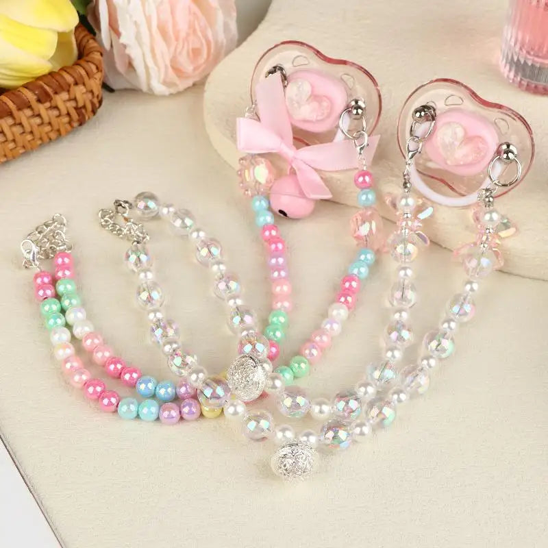 Cute rainbow heart pacifier with playful candy beads, perfect for DDLG ABDL soft girl style