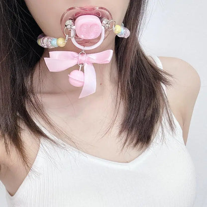 Rainbow pacifier with candy clip, whimsical bell ribbon, soft girl DDLG ABDL aesthetic