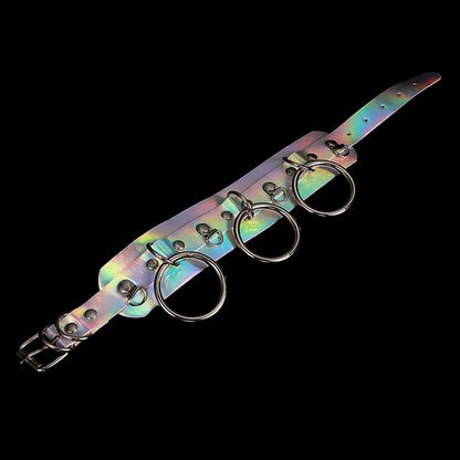 Close-up of holographic collar, reflective shine, bold and playful ddlg roleplay accessory