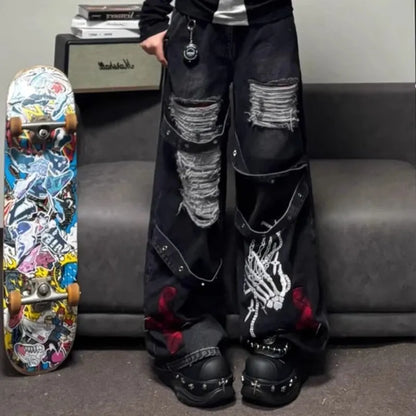 Black ripped goth baddie wide-leg denim pants with bold alternative look