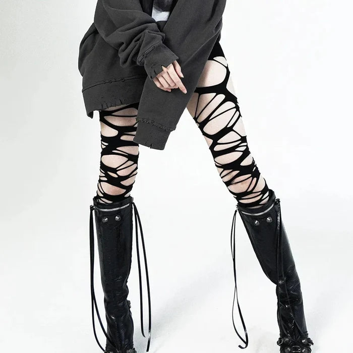 One piece pantyhose version of ripped web tights showing full leg coverage
