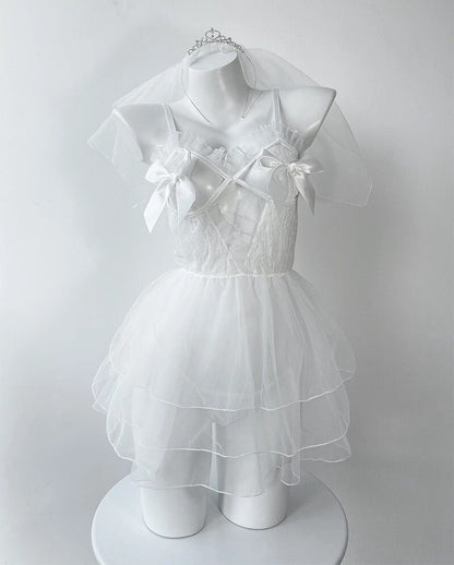 Romantic bridal babydoll lingerie set with sheer dress, matching thong, veil, and thigh-high stockings 