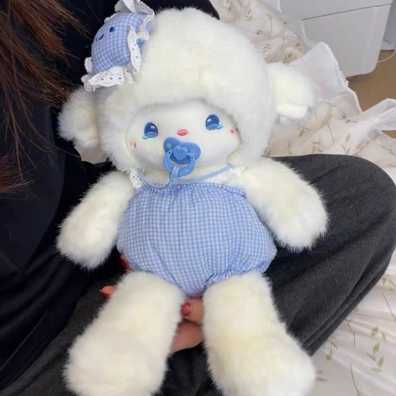 Close up of pacifier and checkered detail on Sleepy Baby Lamb ABDL plush