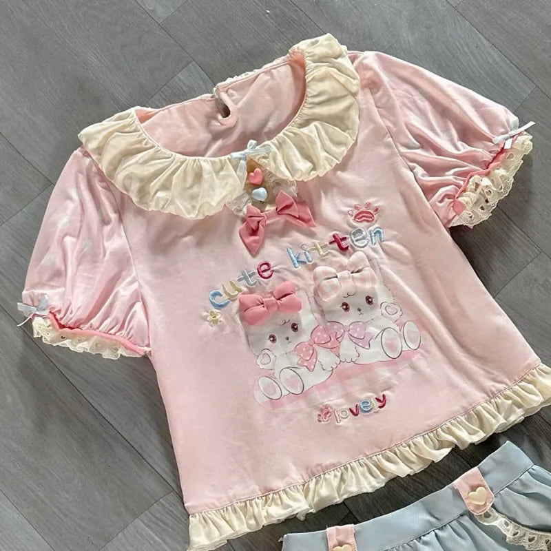 Soft girl fashion outfit with matching kitten t-shirt and skirt in pastel colors