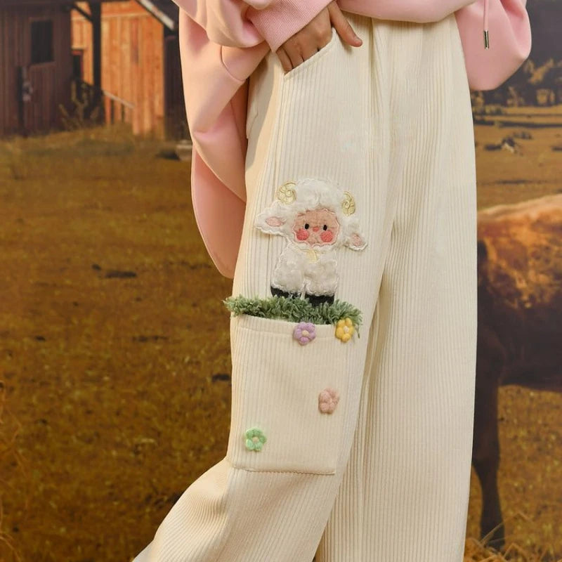 Soft white kawaii pants with plush sheep detail and cloud-soft fabric, perfect for DDLG and pastel lovers