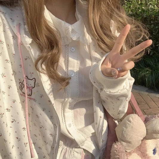Softcore Kitty pastel jacket in pink and white with minimal embroidery, front view