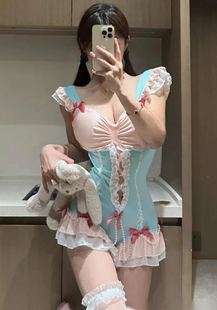 spoiled princess dollcore bodysuit in pastel pink and blue with lace and ruffles, soft-life aesthetic