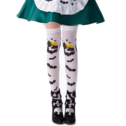Close up of haunted house and full moon illustration on Halloween thigh highs