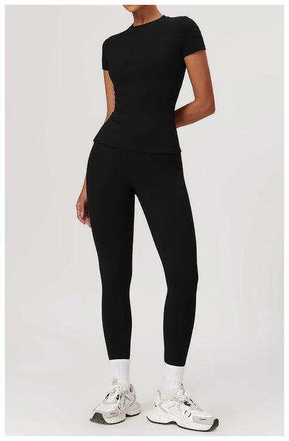 Black babygirl sporty crop top and skirt set, soft nylon spandex fabric for flexible, stylish comfort