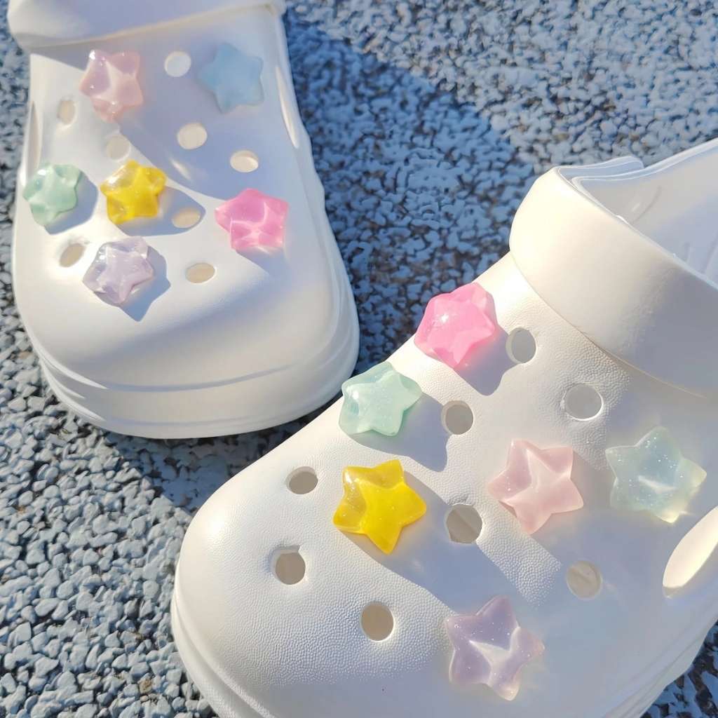 Star-shaped shoe charms for adding cosmic sparkle to sneakers, sandals, and slides