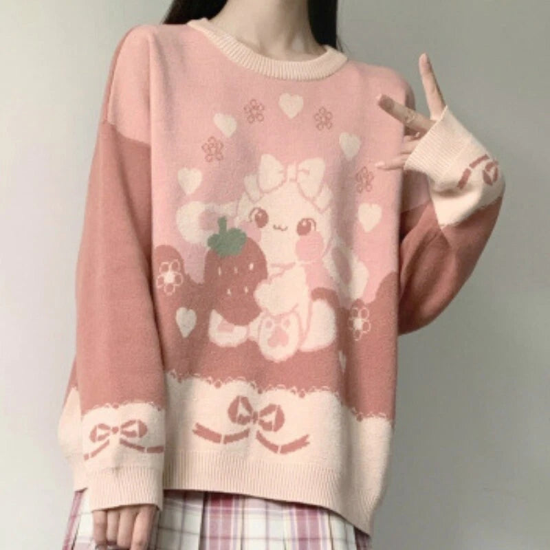 Strawberry Bunny Lolita sweater with oversized bunny artwork, ribbons, hearts, and floral kawaii knit pullover