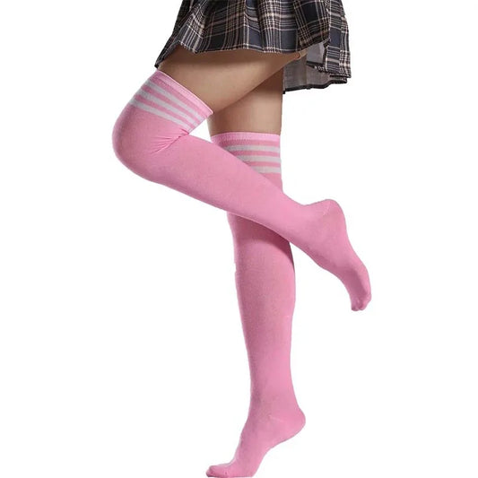 Adorable pink and white striped thigh-high socks for kawaii and DDLG pastelcore style