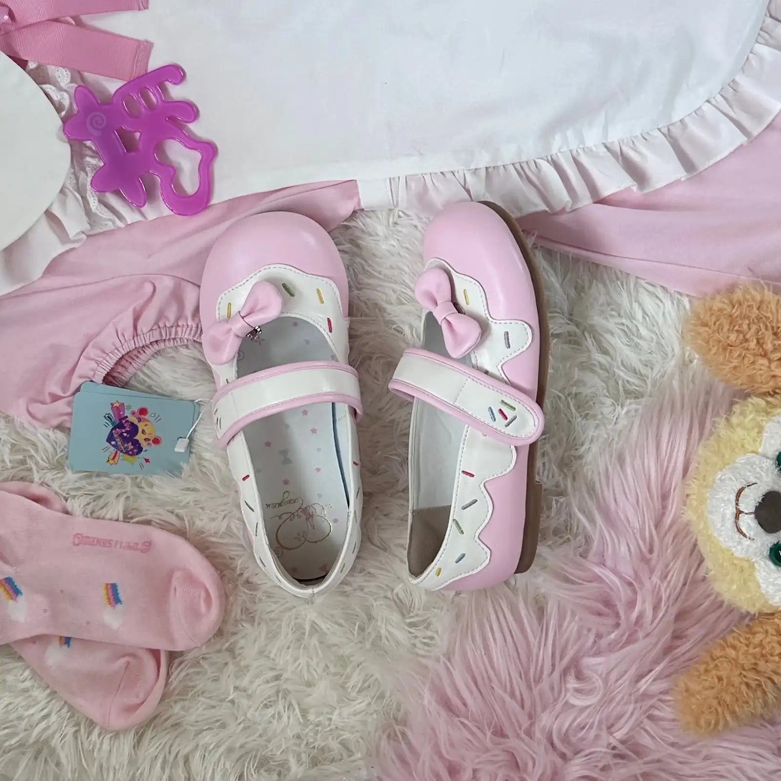 Adorable pink sugar Sweet Lolita Sprinkle Shoes with glossy candy-like finish, oversized 3D bow, and whimsical sprinkle details for kawaii fashion.