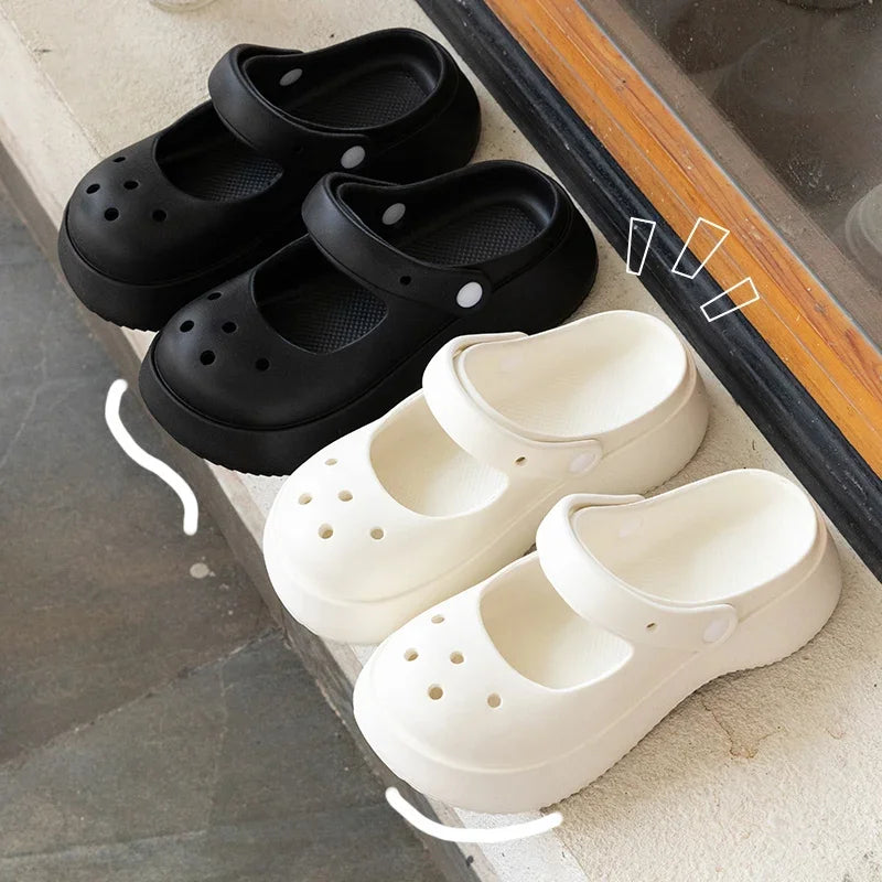 Black and white platform slides side by side in ddlg-inspired fashion