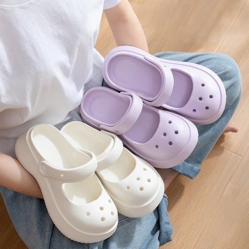 Pink and white platform slide sandals for summer 2025 with soft, chunky design