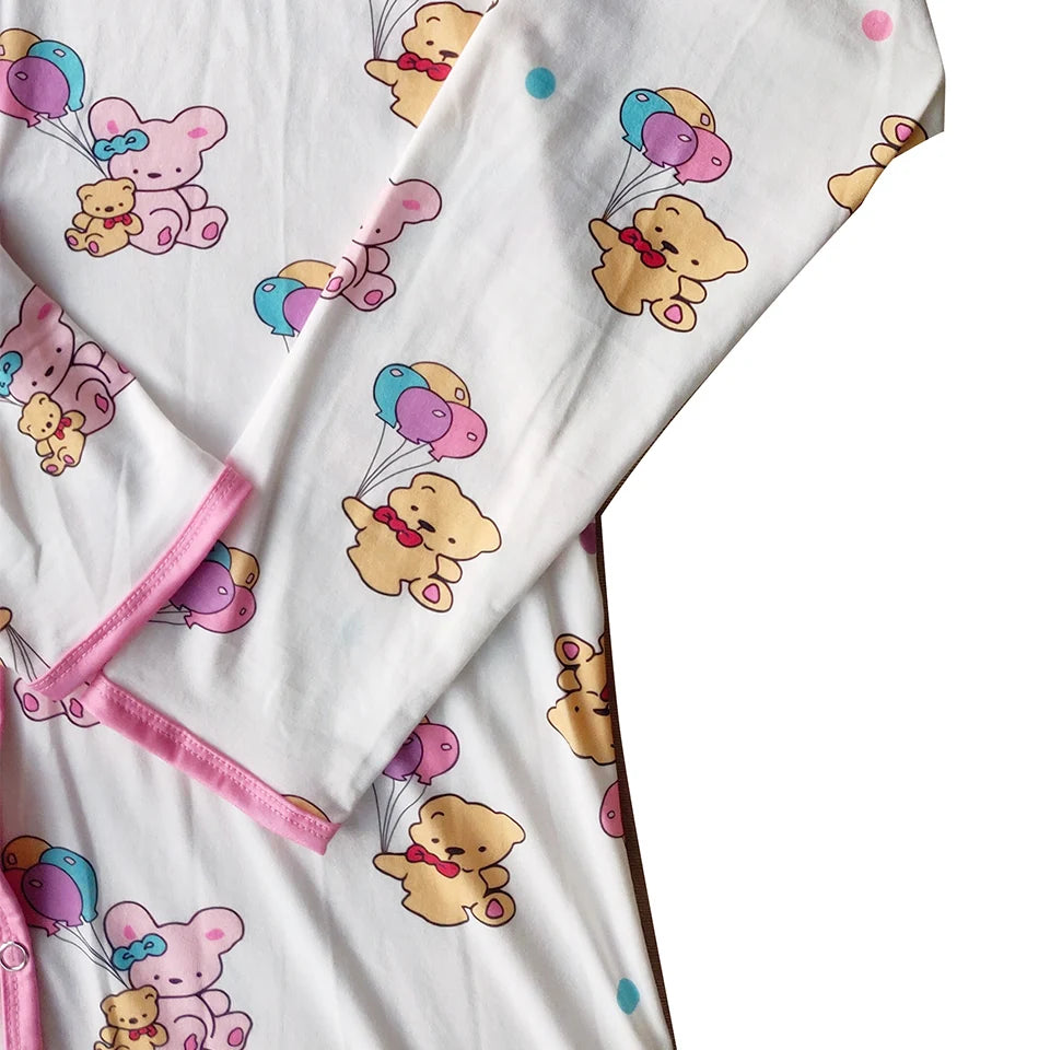 Pink ribbed cuff detail on long sleeves of teddy balloon sleeper onesie