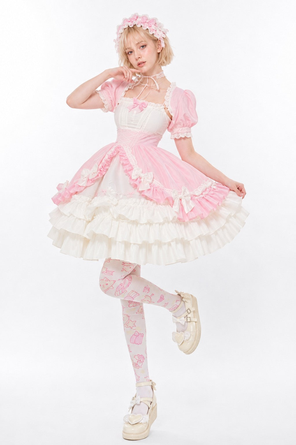 Model wearing pastel pink and white Victorian ruffle Lolita dress, sweet lolita style