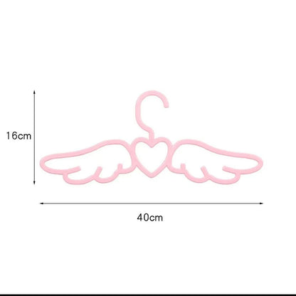 Whimsical closet hanger with wings and heart details perfect for ABDL DDLG kawaii wardrobe