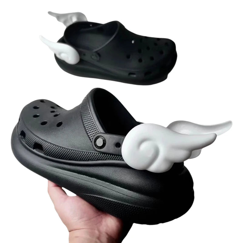 White angel wing charms on black Crocs – soft DIY kawaii charm accessory