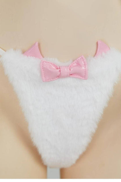 Close-up detail of white kitty cosplay thong with 3D cat ears, ribbon bow and tail attachment from kawaii kitty plush corset cosplay set