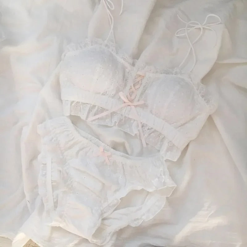 White pastel lace bra and panty lingerie set with soft dollcore aesthetic and feminine ruffle details