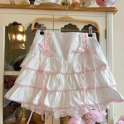 White and pink Lolita ribbon corset skirt with layered frills, high-waist fit, perfect for kawaii, soft girl, DDLG, ABDL, and cutecore outfits