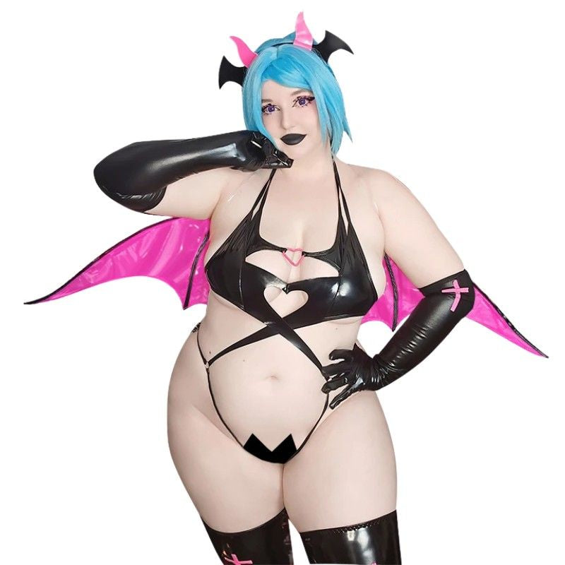 Wicked Temptress lingerie set in fuchsia and black for curvy women, featuring heart hollow chest, lace-up bodysuit, wings, devil tail, and horns