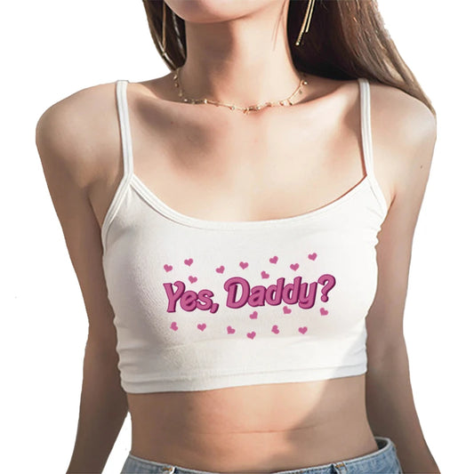 White Yes Daddy cami crop top with tiny heart print, soft stretchy fabric, perfect for casual and trendy outfits